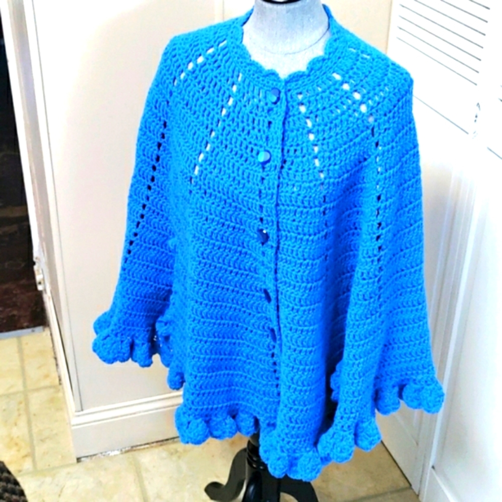 Handmade crochet shawl, beautiful blue with buttons and holes for hands.